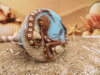 Bouton gros rond fond de mer