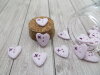 Bouton petit coeur rose pale