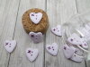 Bouton petit coeur rose pale