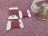 Bouton bobine fil vieux rose