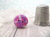 Bouton rond brillant fuchsia violet