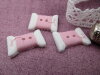 Bouton bobine fil rose