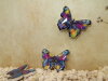 Bouton papillon bleu fuschia et or brillant