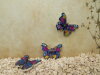 Bouton papillon bleu fuschia et or brillant